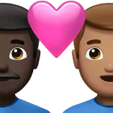 👨🏿‍❤️‍👨🏽 Pasangan dengan Hati Pria dengan Pria Warna Kulit Gelap dengan Warna Kulit Sedang Apple